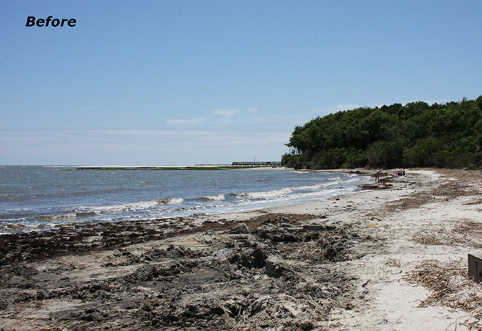 Temporary sand beach access ramp constructed over pipe