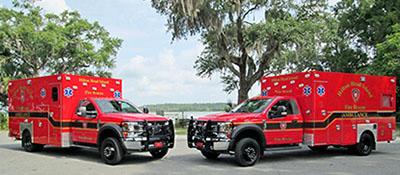 Two Hilton Head Island Ambulances Parked with Ocean View in background