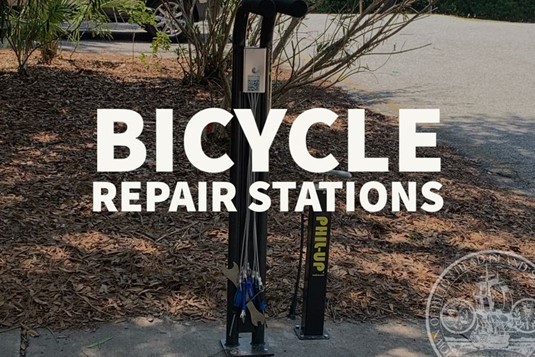 Bicycle Repair Stations text over image of repair station