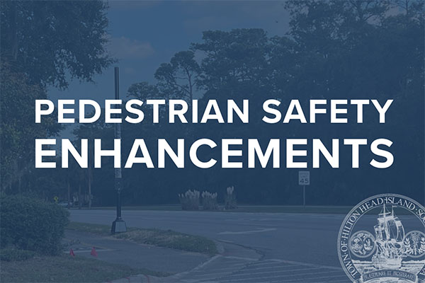 Pedestrian Safety  Enhancements text over image of crosswalk