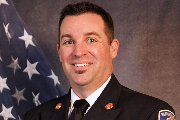 Chris Blankenship Headshot in Fire Rescue Uniform