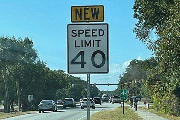 40 mph Speed Limit Traffic Sign with Sign attached to top on roadway